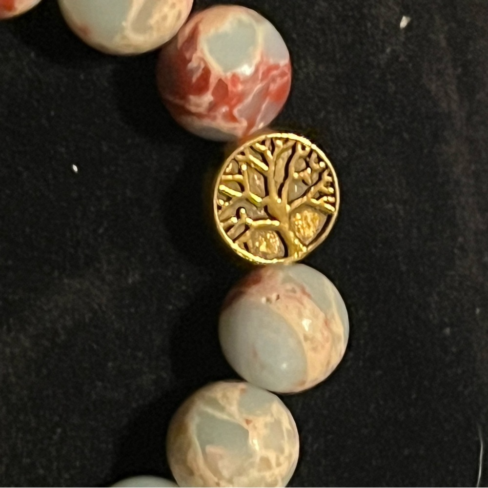 Hand beaded snakeskin Jasper bracelet with copper tree of life charm